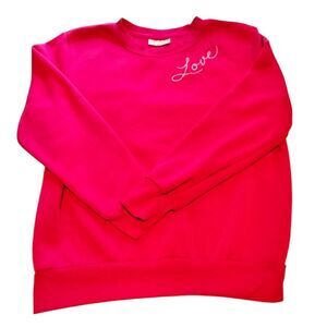 Pink crewneck sweatshirt with embroidered love logo